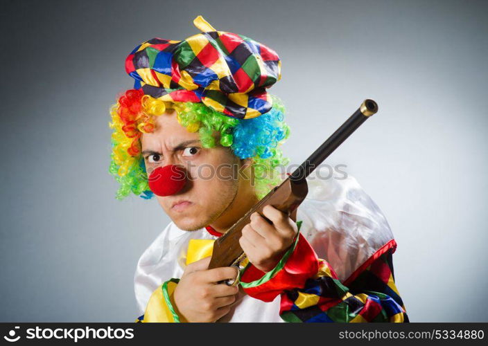 Funny clown in comical concept