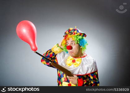 Funny clown in comical concept