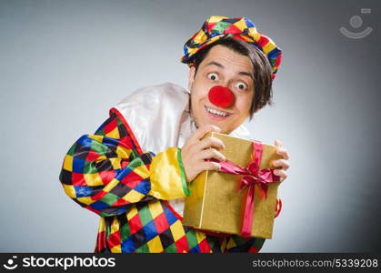 Funny clown in comical concept