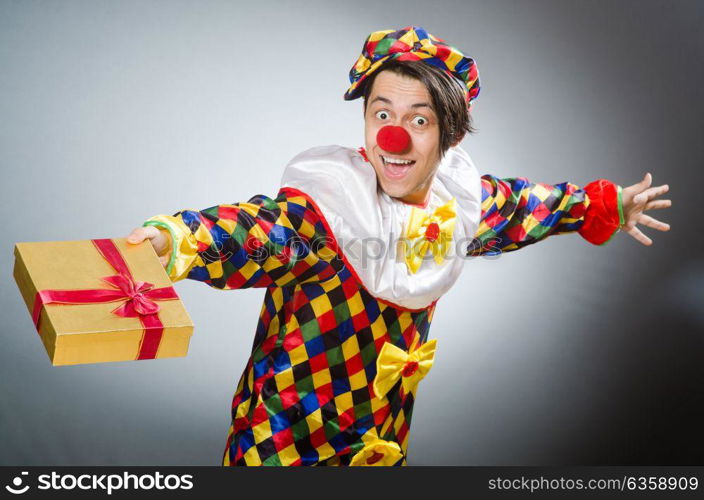 Funny clown in comical concept