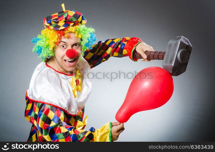 Funny clown in comical concept