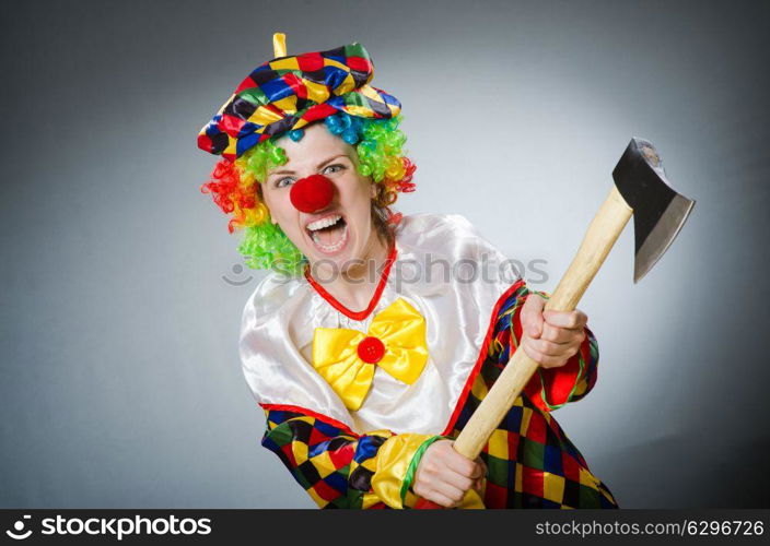 Funny clown in comical concept. The funny clown in comical concept