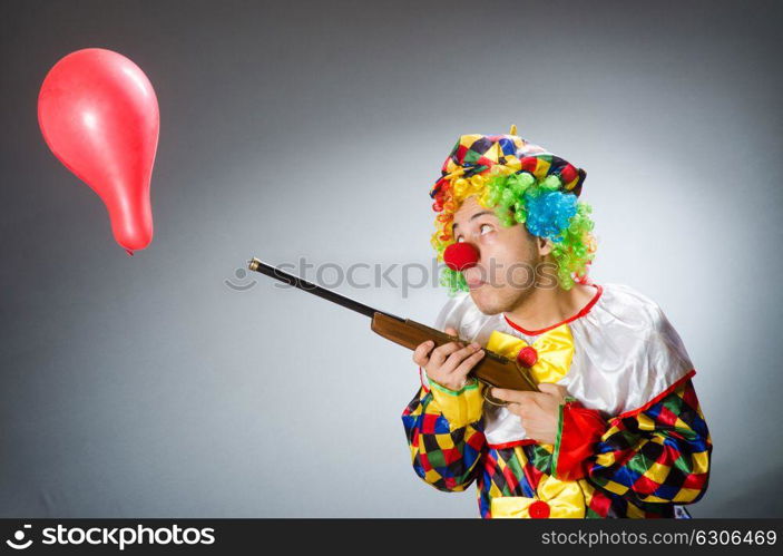Funny clown in comical concept. The funny clown in comical concept