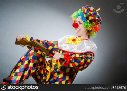 Funny clown in comical concept. The funny clown in comical concept