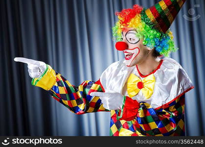 Funny clown in studio shooting