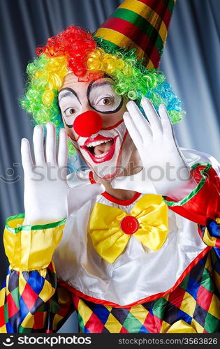 Funny clown in studio shooting