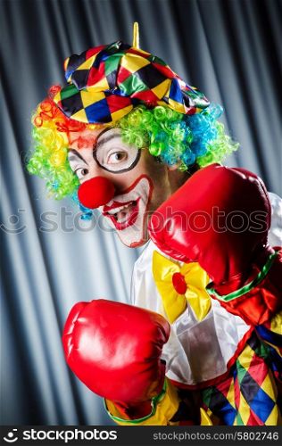 Funny clown in the studio shooting