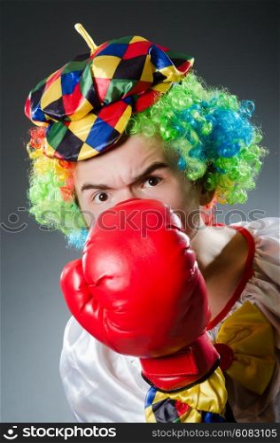 Funny clown with box gloves