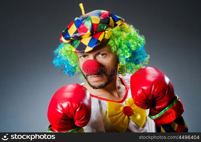 Funny clown with boxing gloves