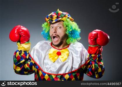 Funny clown with boxing gloves