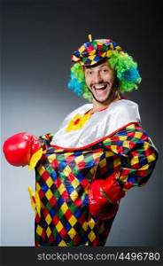 Funny clown with boxing gloves