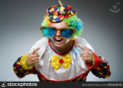Funny clown with giant sunglasses