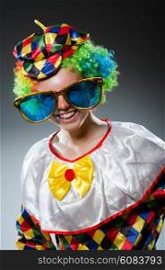 Funny clown with giant sunglasses