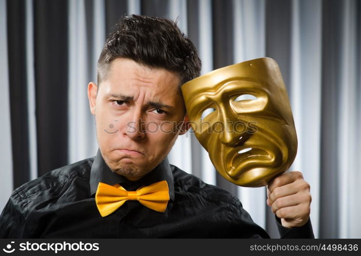 Funny concept with theatrical mask