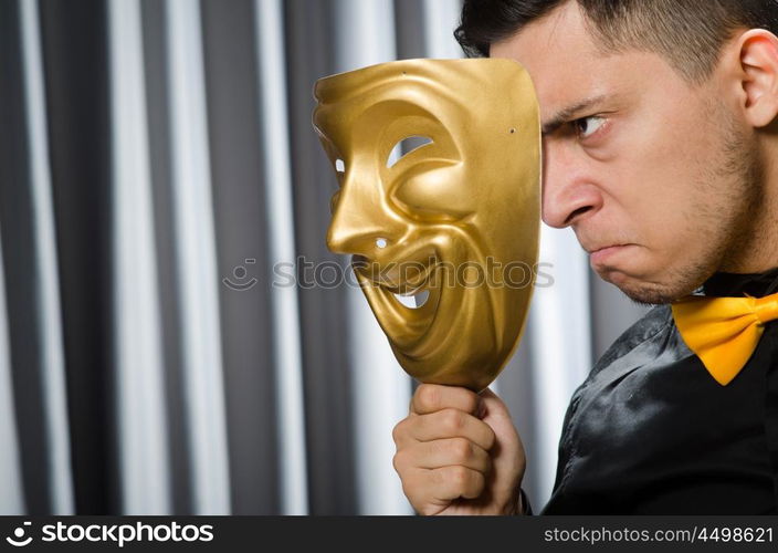 Funny concept with theatrical mask