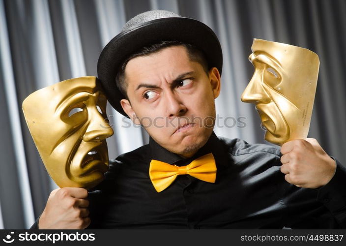 Funny concept with theatrical mask