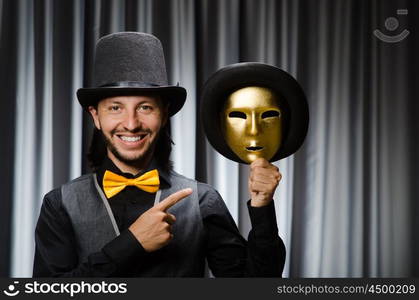 Funny concept with theatrical mask