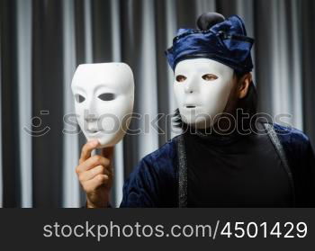 Funny concept with theatrical mask