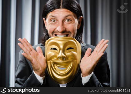 Funny concept with theatrical mask