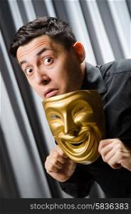Funny concept with theatrical mask