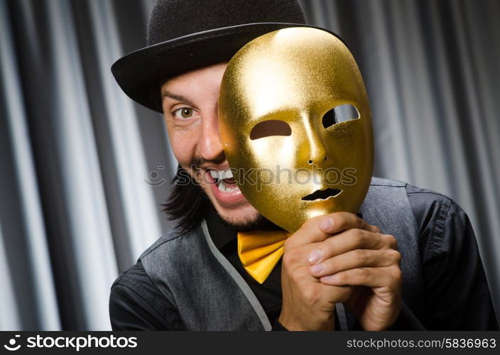 Funny concept with theatrical mask