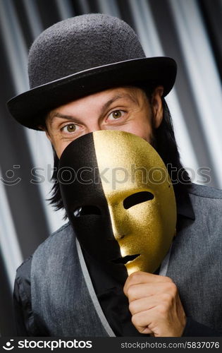 Funny concept with theatrical mask