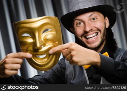 Funny concept with theatrical mask