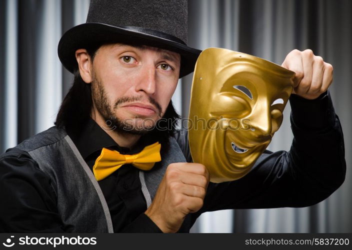 Funny concept with theatrical mask