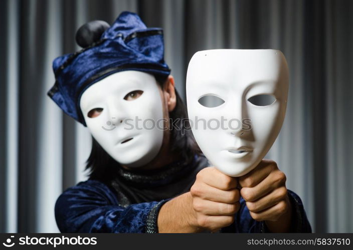 Funny concept with theatrical mask