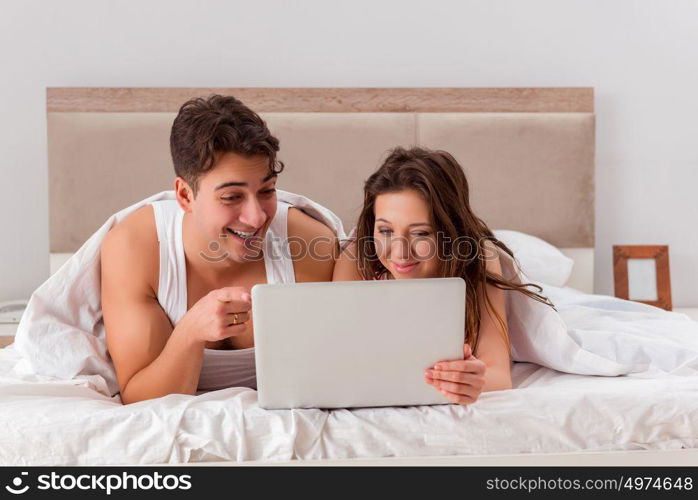 Funny concept with wife and husband in bed