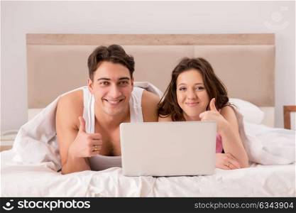 Funny concept with wife and husband in bed