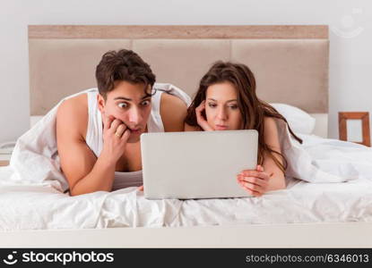 Funny concept with wife and husband in bed