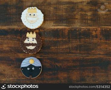 Funny cookie for Christmas on a wooden background