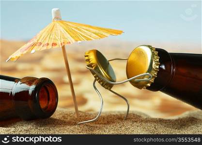 funny cork and bottle on a sandy beach