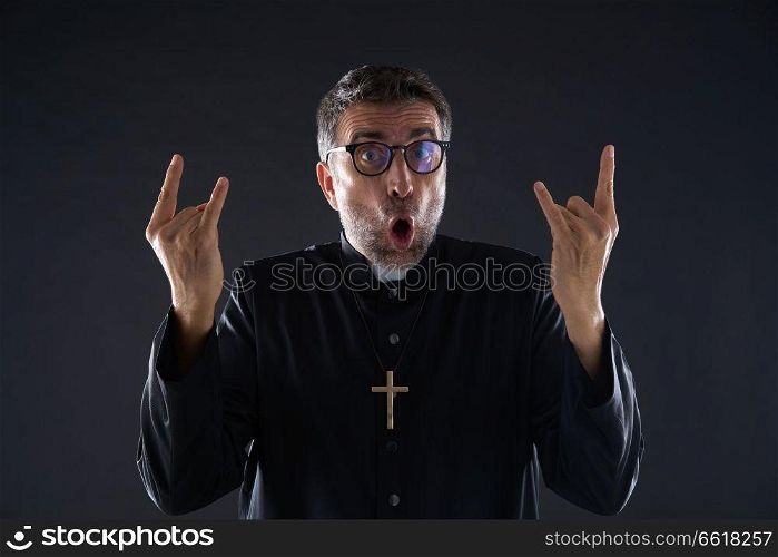 Funny crazy priest rock symbol with fingers hands isolated