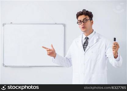 Funny doctor scientist making presentation in hospital. The funny doctor scientist making presentation in hospital