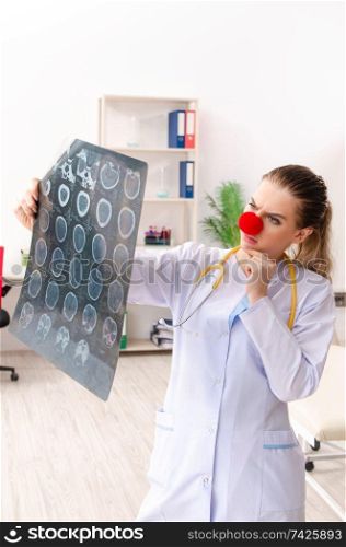 Funny female doctor working in the clinic 
