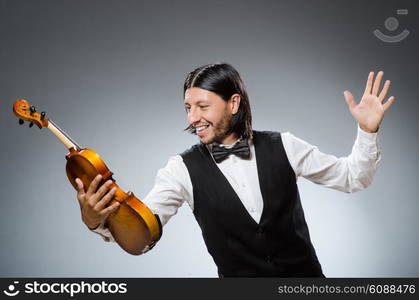 Funny fiddle violin player in musical concept