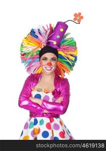 Funny girl clown with a big colorful wig isolated on white background