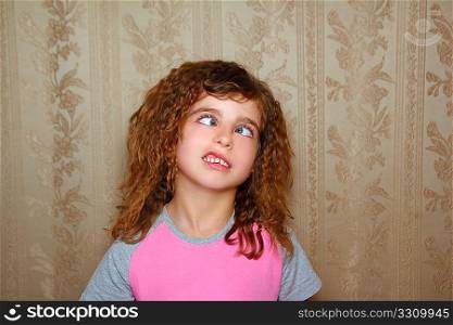 funny girl face ugly expression cross-eyed squinting on retro wallpaper