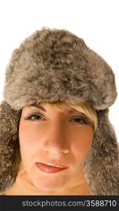 Funny girl in fur-cap isolated on white background