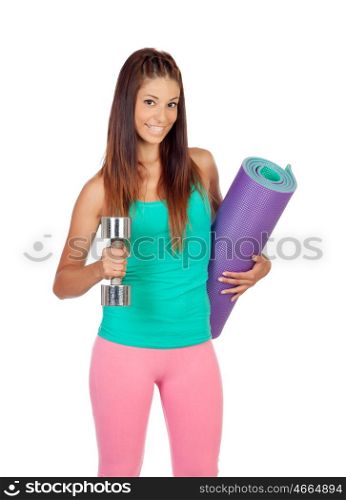 Funny girl in sportswear with a mat and dumbbell isolated on white background
