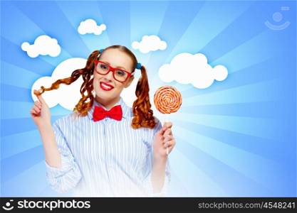 Funny girl with lollipop. Image of funny lady in red glasses with lollipop
