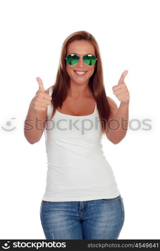 Funny girl with sunglasses saying Ok isolated on a white background