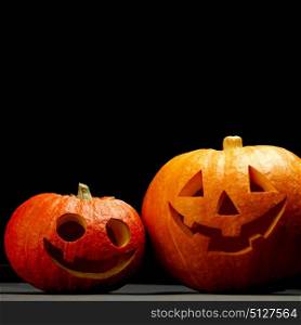 Funny halloween pumpkins isolated on black background. Funny halloween pumpkins