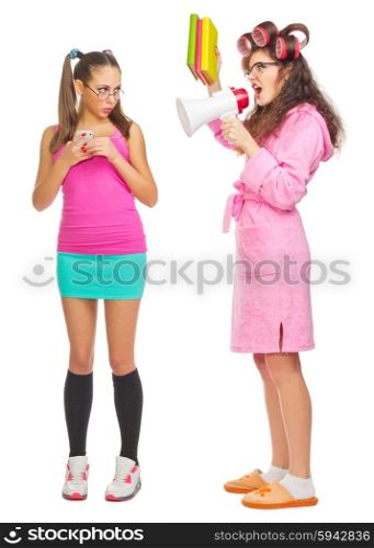 Funny housewife with books and megaphone screams to girl isolated