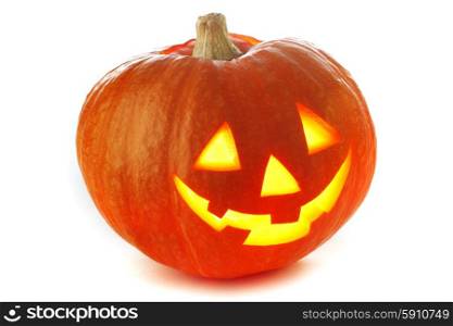 Funny Jack O Lantern halloween pumpkin with candle light inside isolated on white background. Funny Jack O Lantern