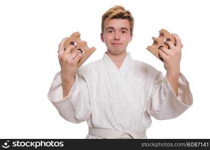 Funny karate man breaking bricks isolated on white