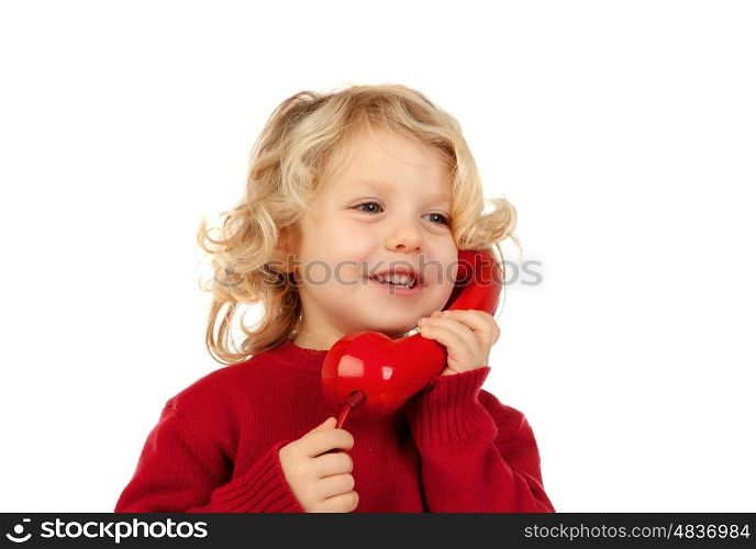 Funny little child talking on the phone isolated on a white background
