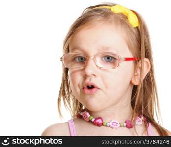 Funny little girl in glasses eating a bread doing fun isolated on white background. Happy childhood
